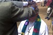 Graham Kings being prayed for by traditional and church elders, Lukura, Kajo-Keji, South Sudan, 2014