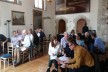 Attendees discuss the seminar