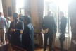 Attendees enjoy drinks after the lecture