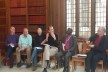 Attendees at the Mission Theology in the Anglican Communion seminar by Professor John Mbiti ask questions following the seminar