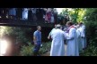 Graham Kings, as Bishop of Sherborne, baptising in the river at Gillingham, after a week of mission activity in 2012