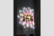 Light from Rose window in St Peter's Cathedral, Geneva, thrown onto wall of opposite transept